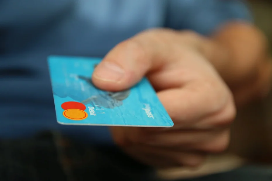 A person offering a credit card for payment to a merchant for goods or services.