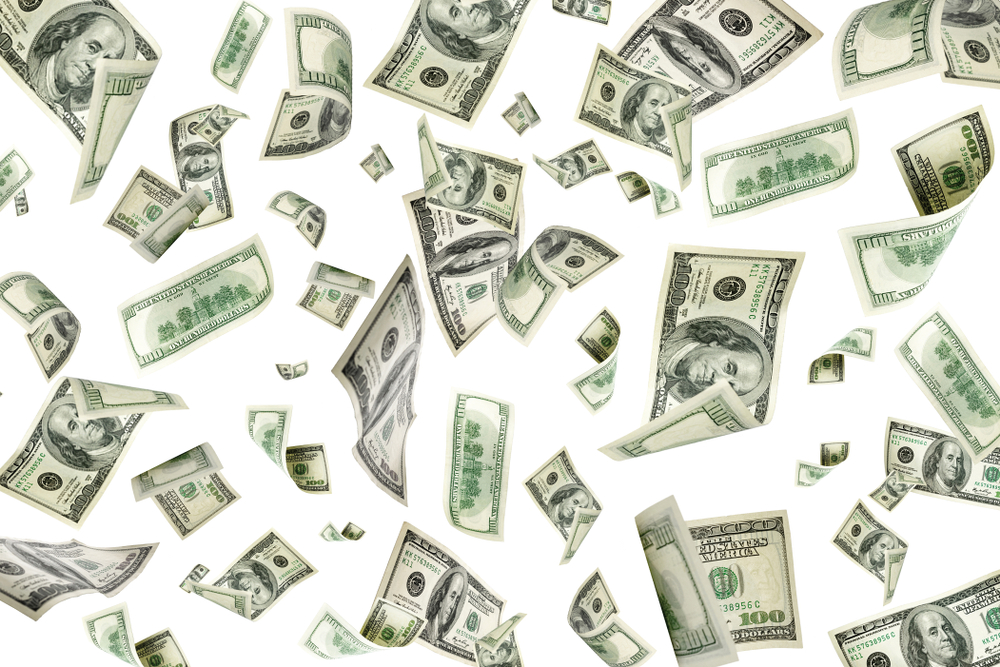 Pile of money to show benefits of using an internet payment gateway