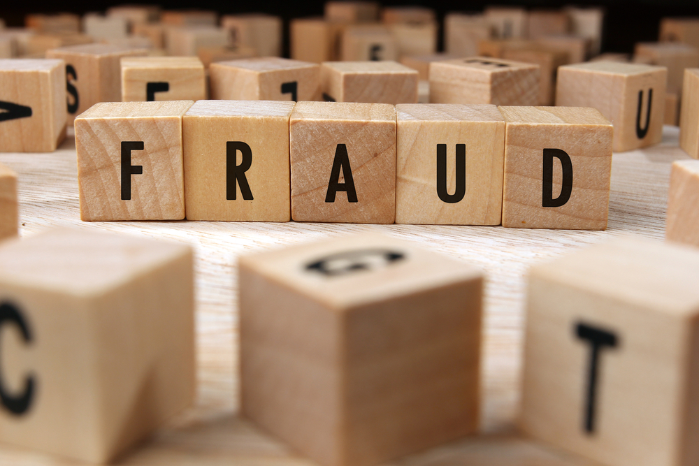 The word fraud is spelled out with blocks surrounded by other blocks to symbolize the fraud that a payment gateway system can help you prevent.